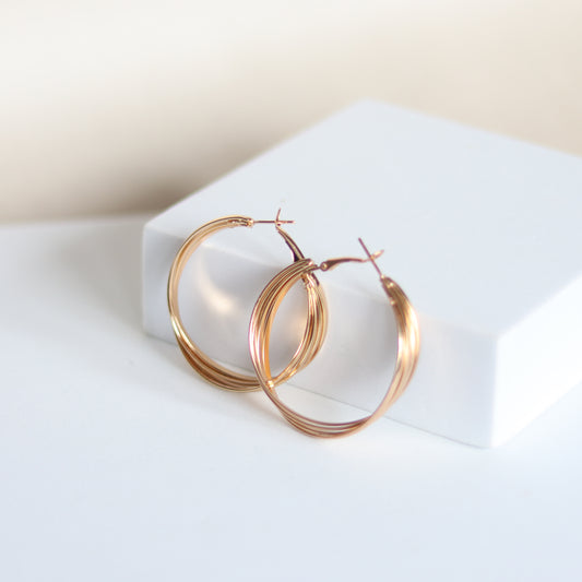 intertwine hoops   gold