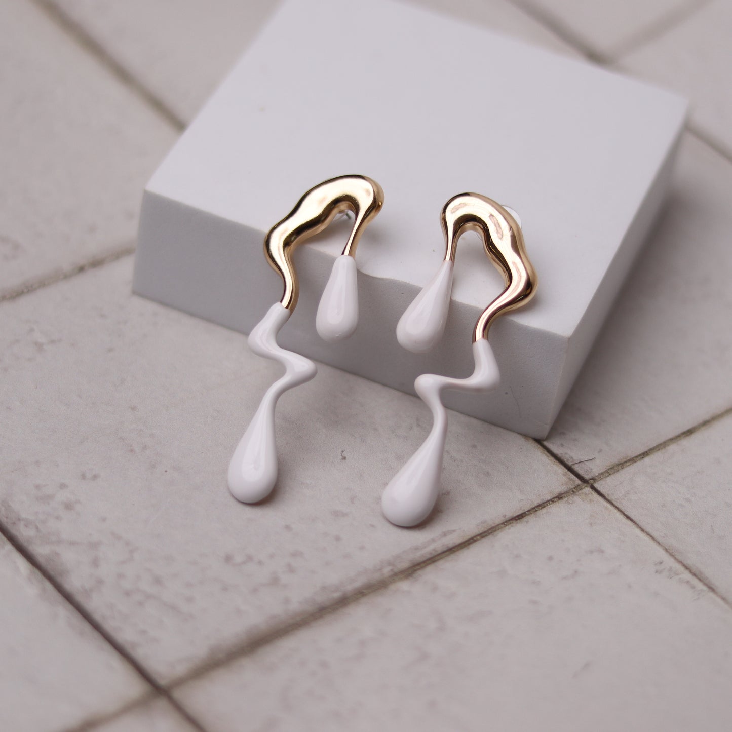 mercury earrings white