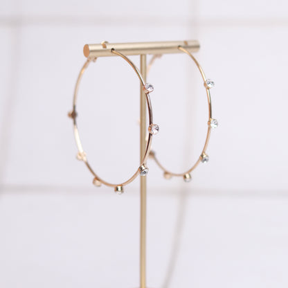 spaced out hoops   gold